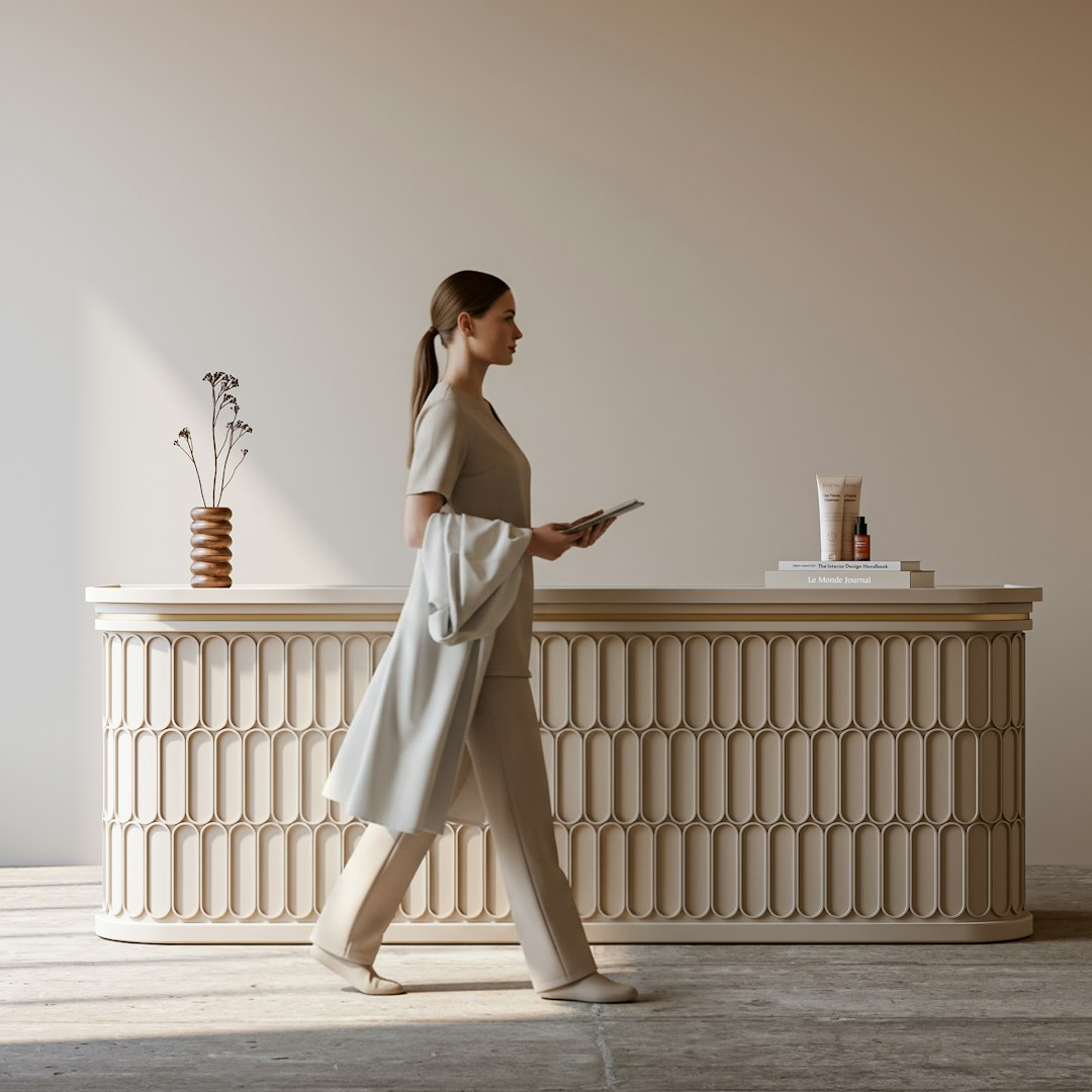 SkyBeauty therapist standing behind the reception counter in the Cork clinic
