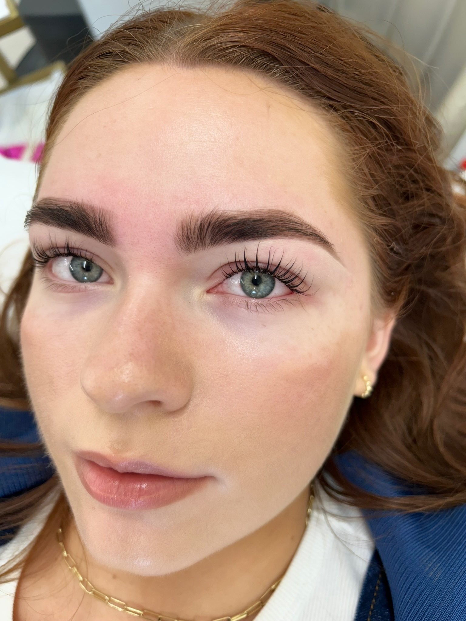 Close-up of combination brow treatment showing naturally full, sculpted brows